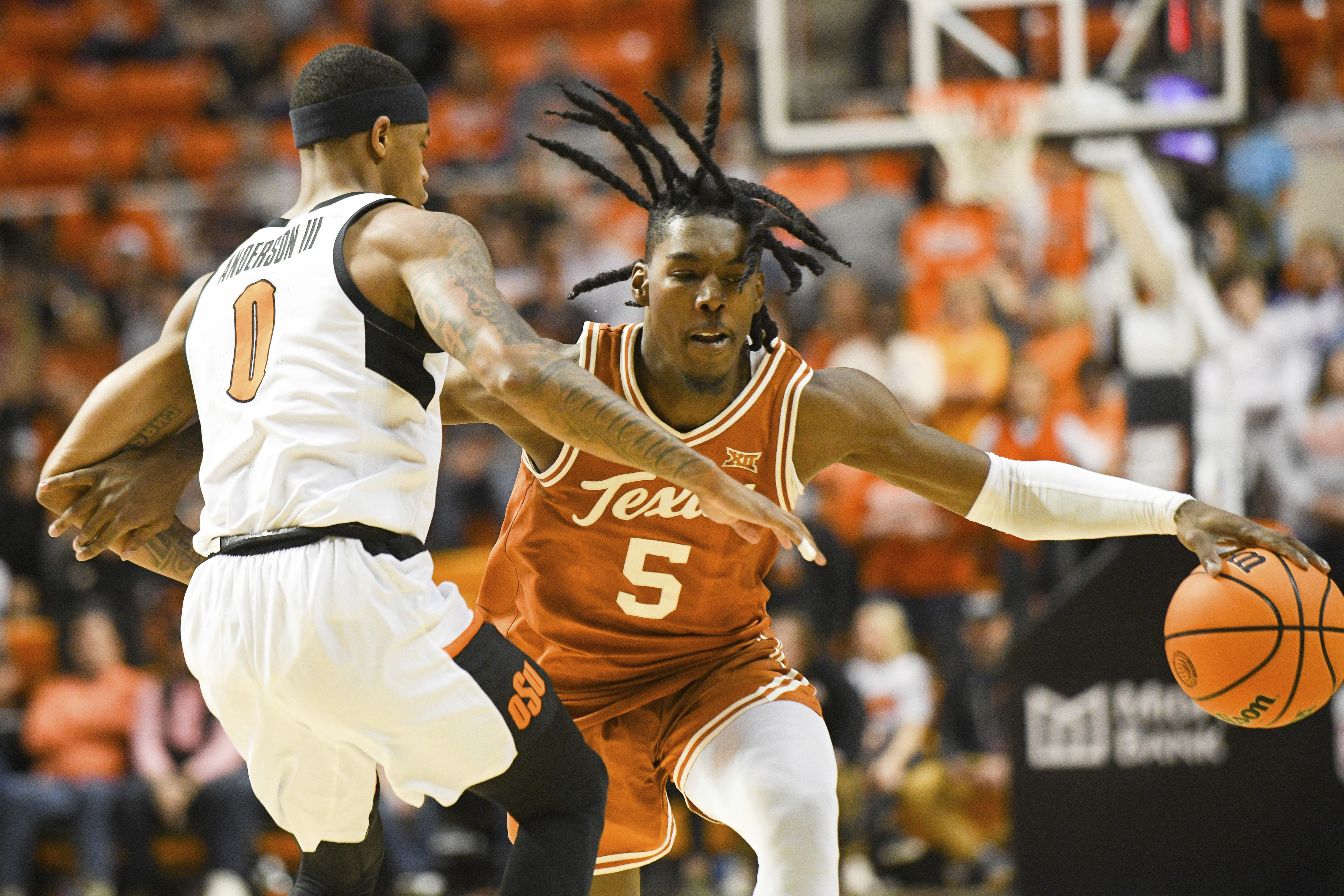 Carr, tough defense lead No. 6 Texas past Oklahoma St., 56-46 - Vimarsana News