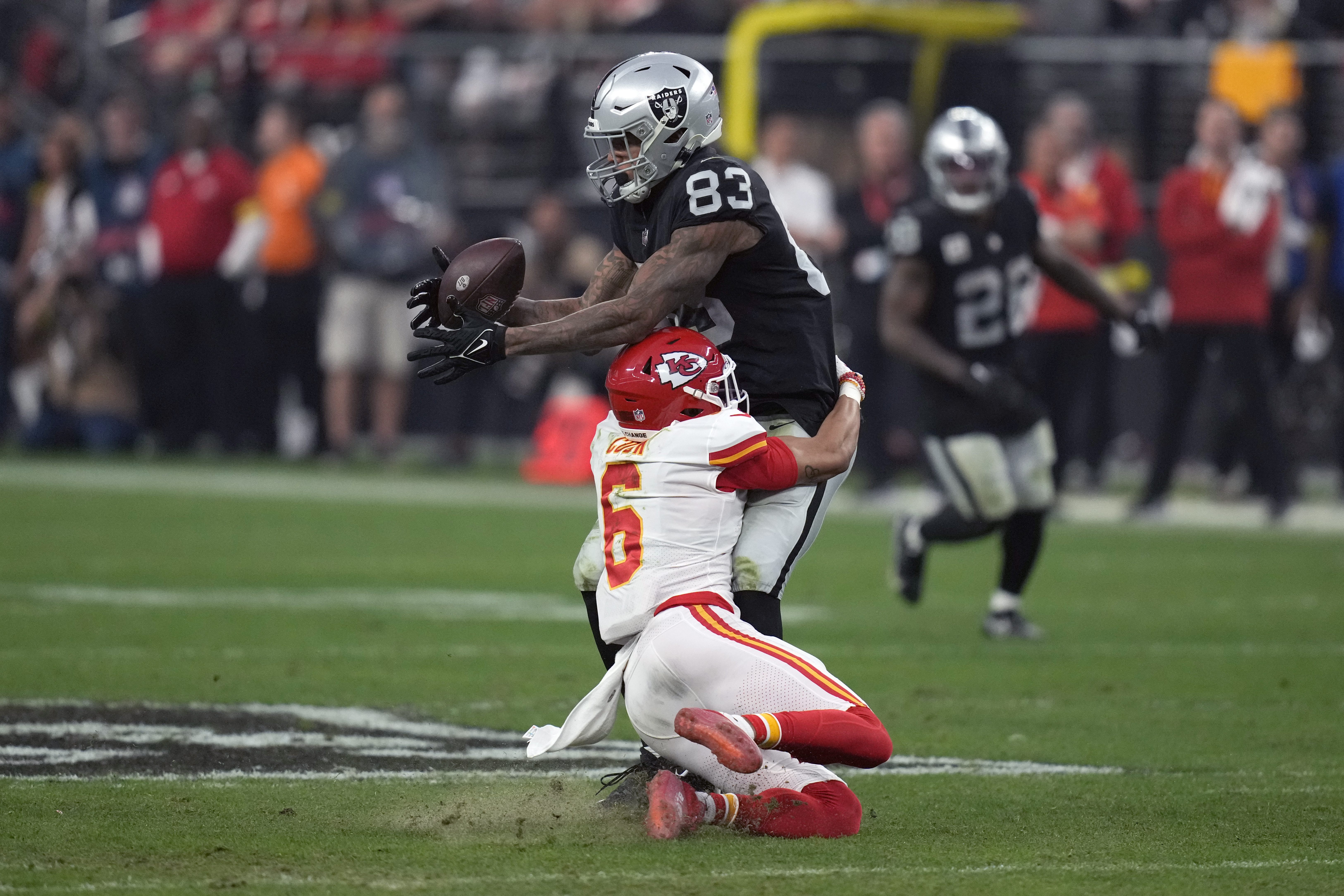 Kansas City Chiefs running back Jerick McKinnon (1) celebrates with  teammates after a Chiefs touchdown against the Las Vegas Raiders in an NFL  football game, Saturday, Jan. 7, 2023, in Las Vegas