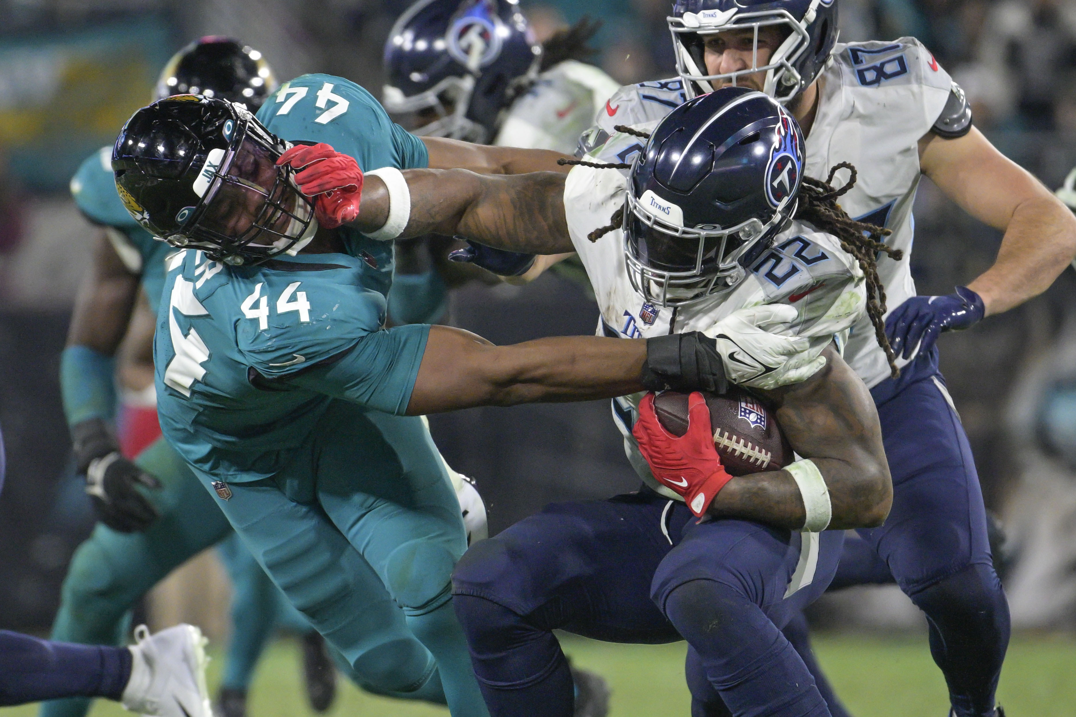 January 7, 2023: Tennessee Titans quarterback Joshua Dobbs (11) is sacked  by Jacksonville Jaguars defensive end Roy Robertson-Harris (95) during a  game in Jacksonville, FL. Romeo T Guzman/CSM/Sipa USA.(Credit Image: © Romeo