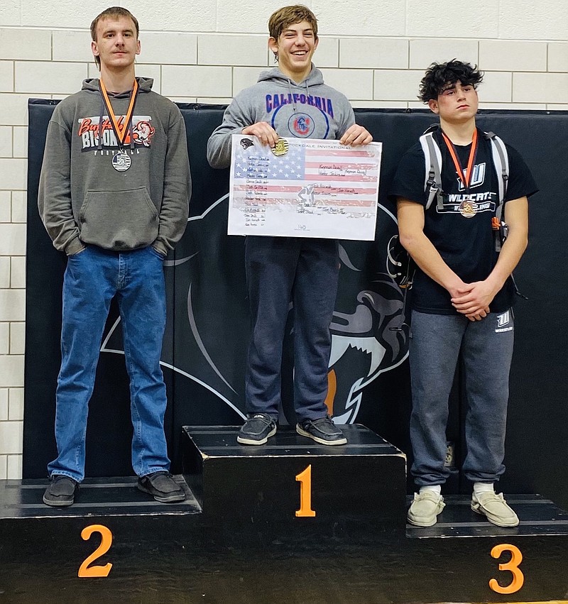 Junior Kwynnon Duvall (center) won the 165lb division at the Ray Stockdale Invitational Tournament on Dec. 3. (Photo submitted by Danielle Morrow)