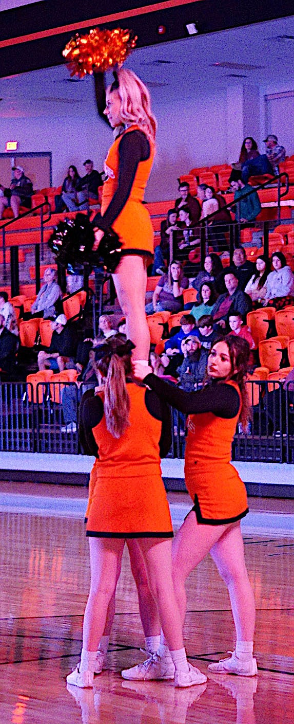 Westside Eagle Observer/RANDY MOLL
The Gravette cheerleaders welcomed the Lion basketball team to the floor at the opening of the Jan. 3 game in Lion Arena.