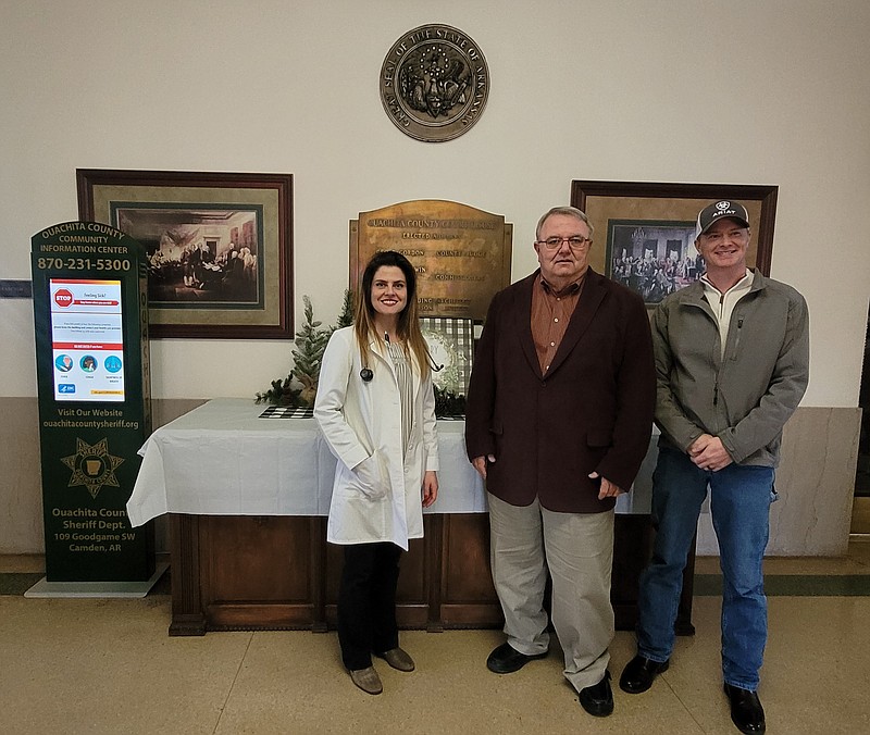 Photo by Bradly Gill
From left Oauchita County Health Officer Dr. Jera Smith poses with Ouachita County Judge Robert McAdoo and Ouachita County Emergency Coordinator Adam LaDuke.