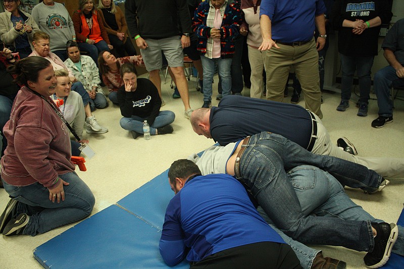 Redwater Independent School District teachers and staff practice a takedown during active shooter simulation Monday afternoon, Jan. 9, 2023, at the elementary school in Redwater, Texas. The training was facilitated by LifeNet and area law enforcement. (Staff photo by Mallory Wyatt)