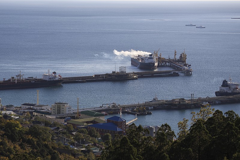 FILE - Oil tankers are moored at the Sheskharis complex, part of Chernomortransneft JSC, a subsidiary of Transneft PJSC, the largest facilities for oil and petroleum products in southern Russia, in Novorossiysk, Tuesday, Oct. 11, 2022. Russia's still making plenty of money from oil sales despite a price cap imposed by the Group of Seven major democracies. Researchers at Helsinki's Centre for Research on Energy and Clean Air said in report Wednesday Jan. 11, 2023 that the cap is too lenient at $60 per barrel. (AP Photo, File)