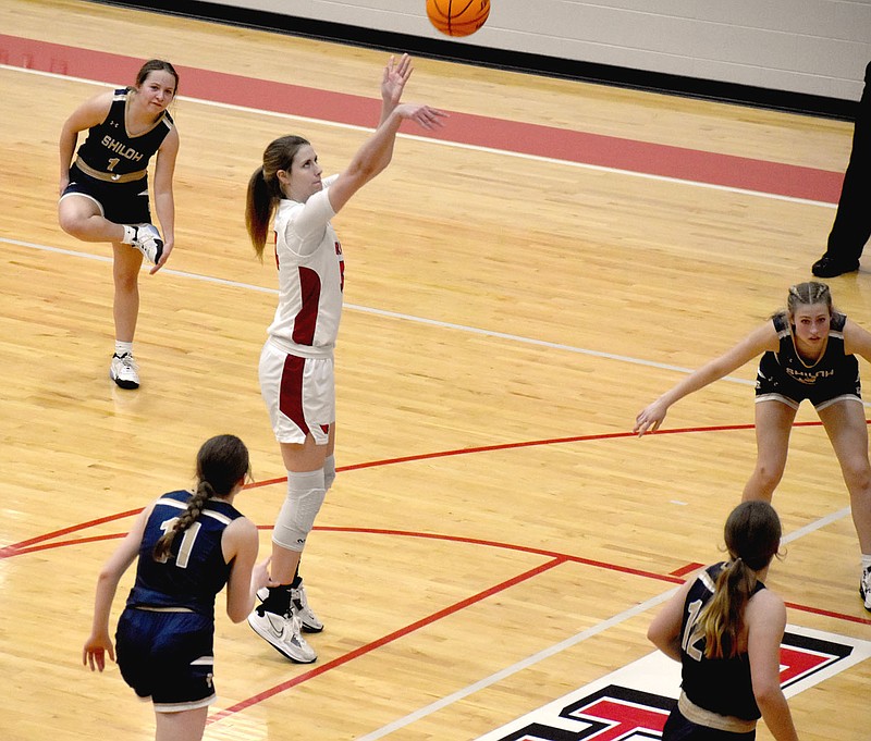 Mark Humphrey/Enterprise-Leader
The body language of Shiloh Christian players reflects their frustration as powerless to defend a free throw attempt by Farmington senior Jenna Lawrence after she was fouled. Lawrence scored 30 points on senior night to round out her playing career at Cardinal Arena in a 70-34 pounding of the Lady Saints on Tuesday, Feb. 7, 2023.