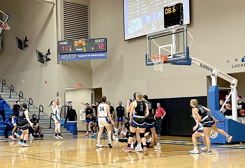 Graham Thomas/Herald-Leader
John Brown junior Natalie Smith launches a 3-pointer near the end of overtime, but the shot was wiped out by an offensive foul as JBU fell to Southwestern Christian 75-71 Saturday at Bill George Arena.