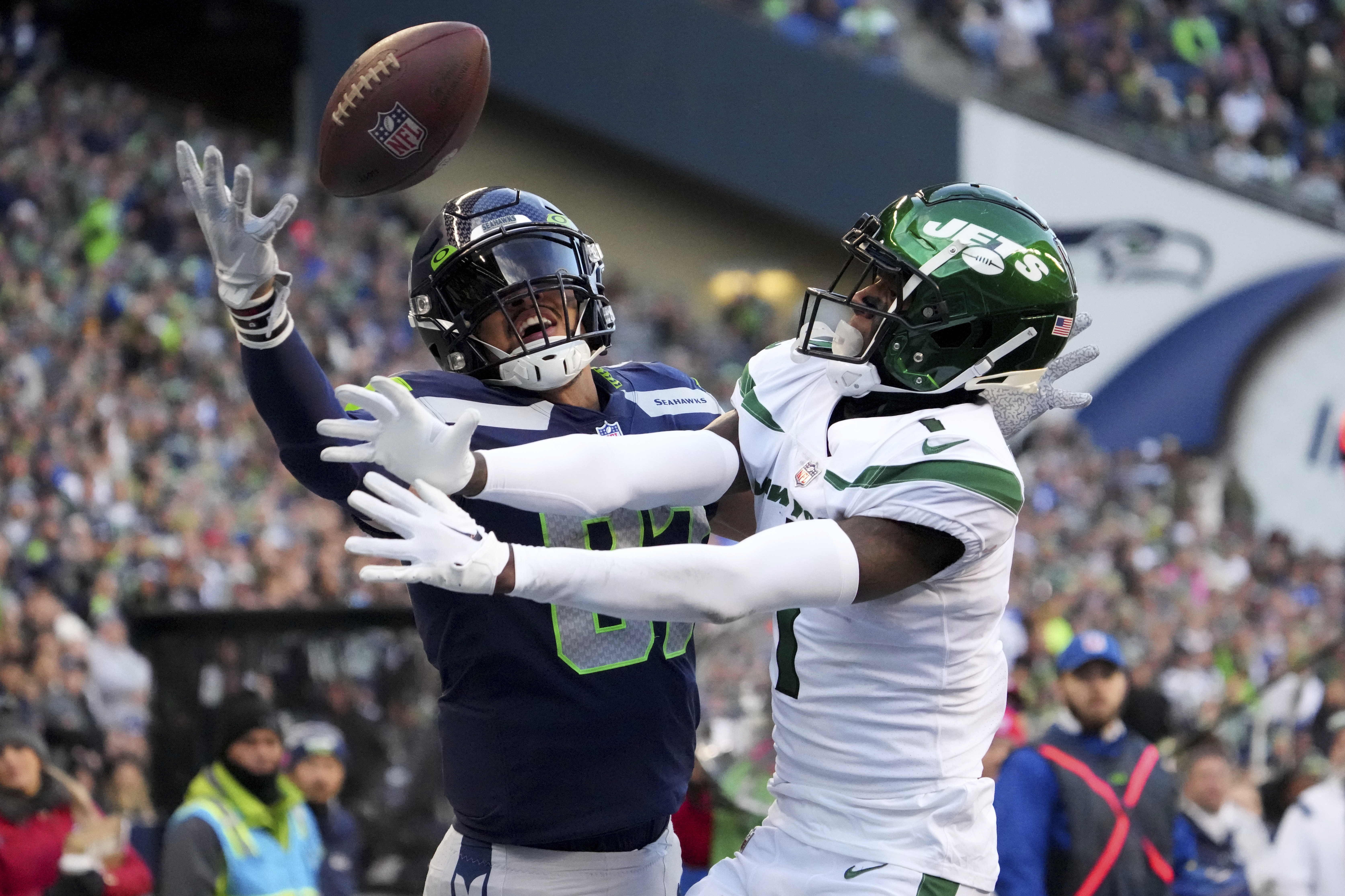 Minnesota Vikings tight end T.J. Hockenson (87) looks to catch a pass ahead  of Dallas Cowboys safety Donovan Wilson (6) during the first half of an NFL  football game, Sunday, Nov. 20