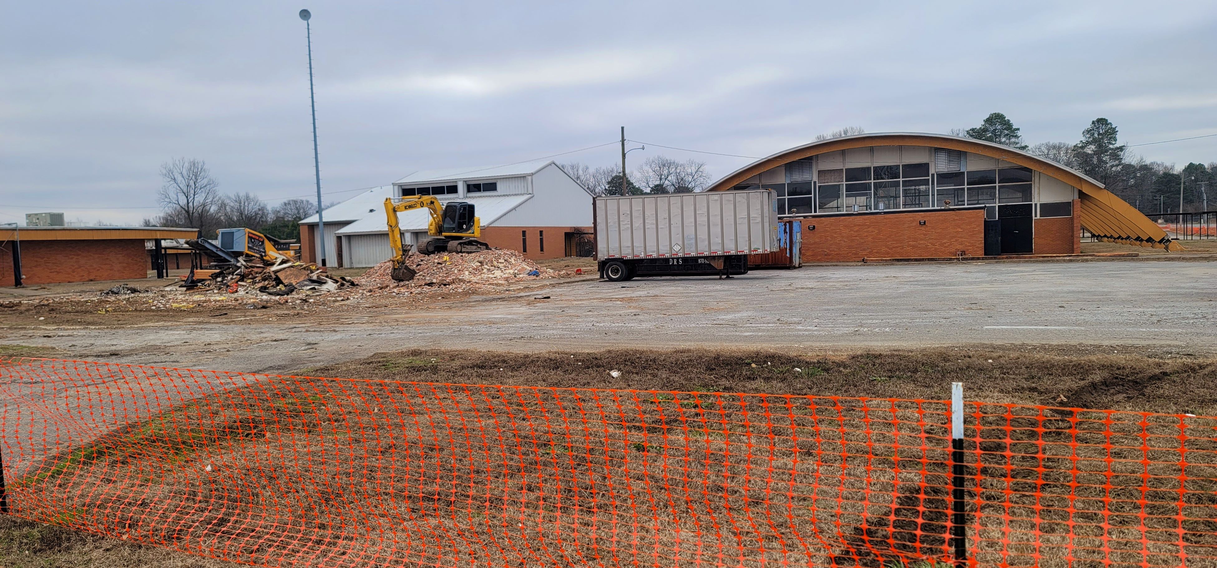Crews begin tearing down Southeast school