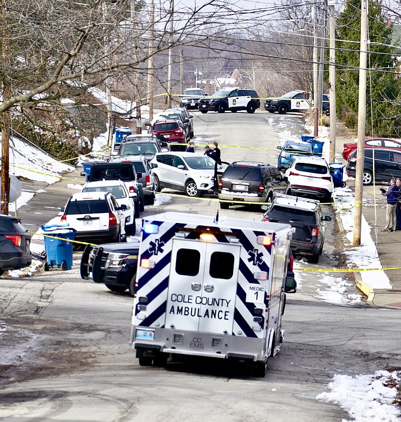 Julie Smith/News Tribune photo: 
This is the scene looking west from the 200 block of West Atchison Street as personnel from the Jefferson City Police Department, Cole County Sheriff and Cole Count EMS responded to the scene of a shooting Saturday afternoon, Jan. 14, 2023, in the 300 block of West Atchison Street.