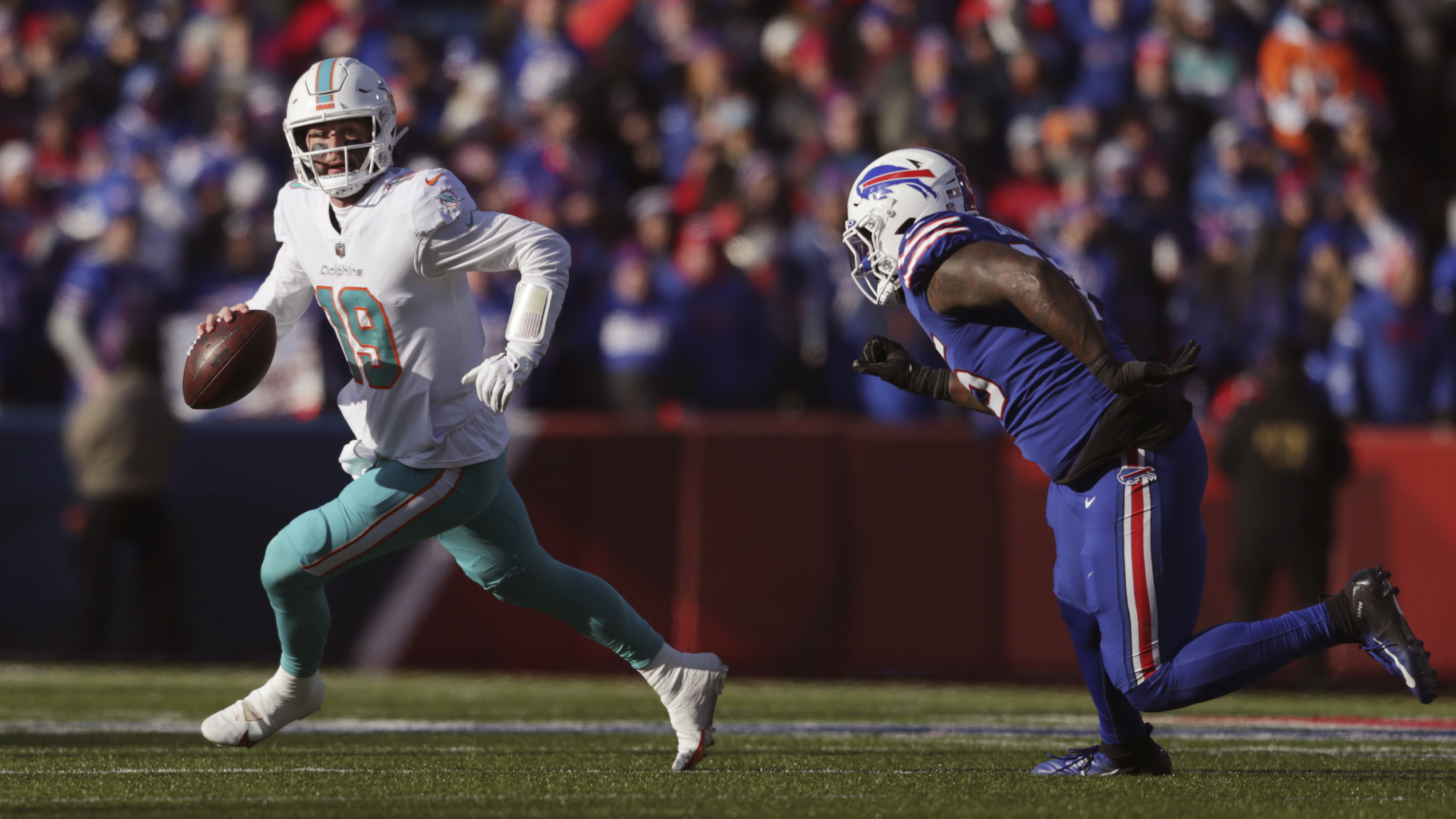 Miami Dolphins cornerback Eric Rowe (21) stretches during warm ups ahead of  an NFL football game against the Buffalo Bills, Sunday, Sept. 19, 2021, in  Miami Gardens, Fla. (AP Photo/Wilfredo Lee Stock