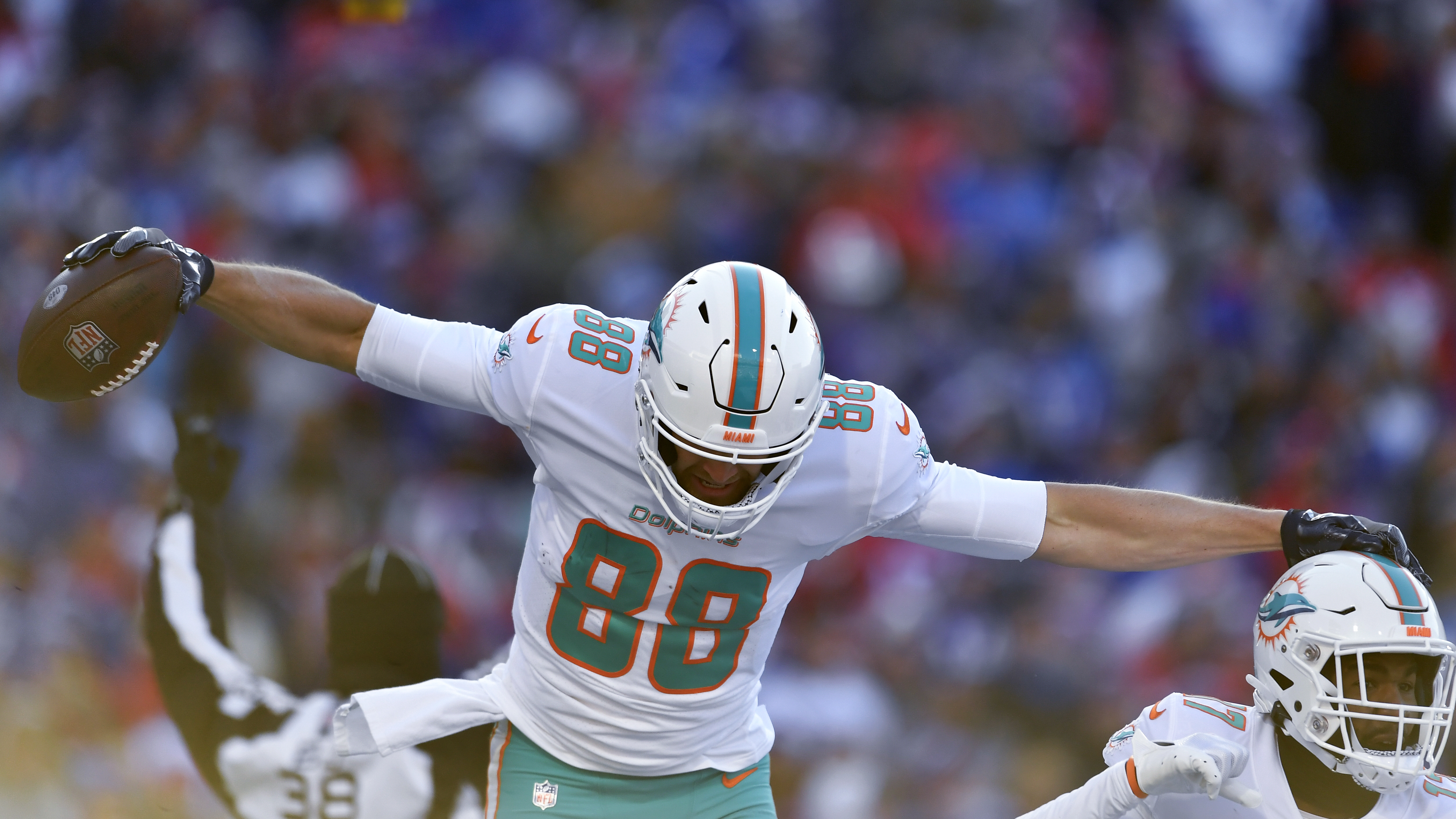 Miami Dolphins cornerback Eric Rowe (21) stretches during warm ups ahead of  an NFL football game against the Buffalo Bills, Sunday, Sept. 19, 2021, in  Miami Gardens, Fla. (AP Photo/Wilfredo Lee Stock