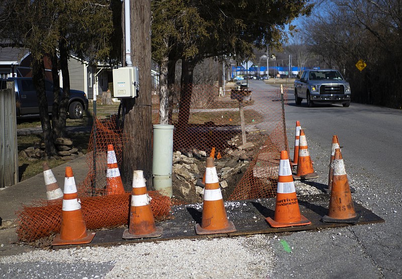 Cones close off a sidewalk project, Friday, January 13, 2023 on the corner of Hollywood Avenue and Parnell Drive in Fayetteville. Visit nwaonline.com/photos for today's photo gallery.

(NWA Democrat-Gazette/Charlie Kaijo)