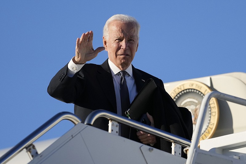 President Joe Biden waves before boarding Air Force One at Delaware Air National Guard Base in New Castle, Del., Sunday, Jan. 15, 2023, en route to Atlanta. Newly empowered House Republicans on Sunday demanded the White House turn over all information related to its searches that have uncovered classified documents at President Joe Biden’s home and former office in the wake of more records found at his Delaware residence. (AP Photo/Carolyn Kaster)