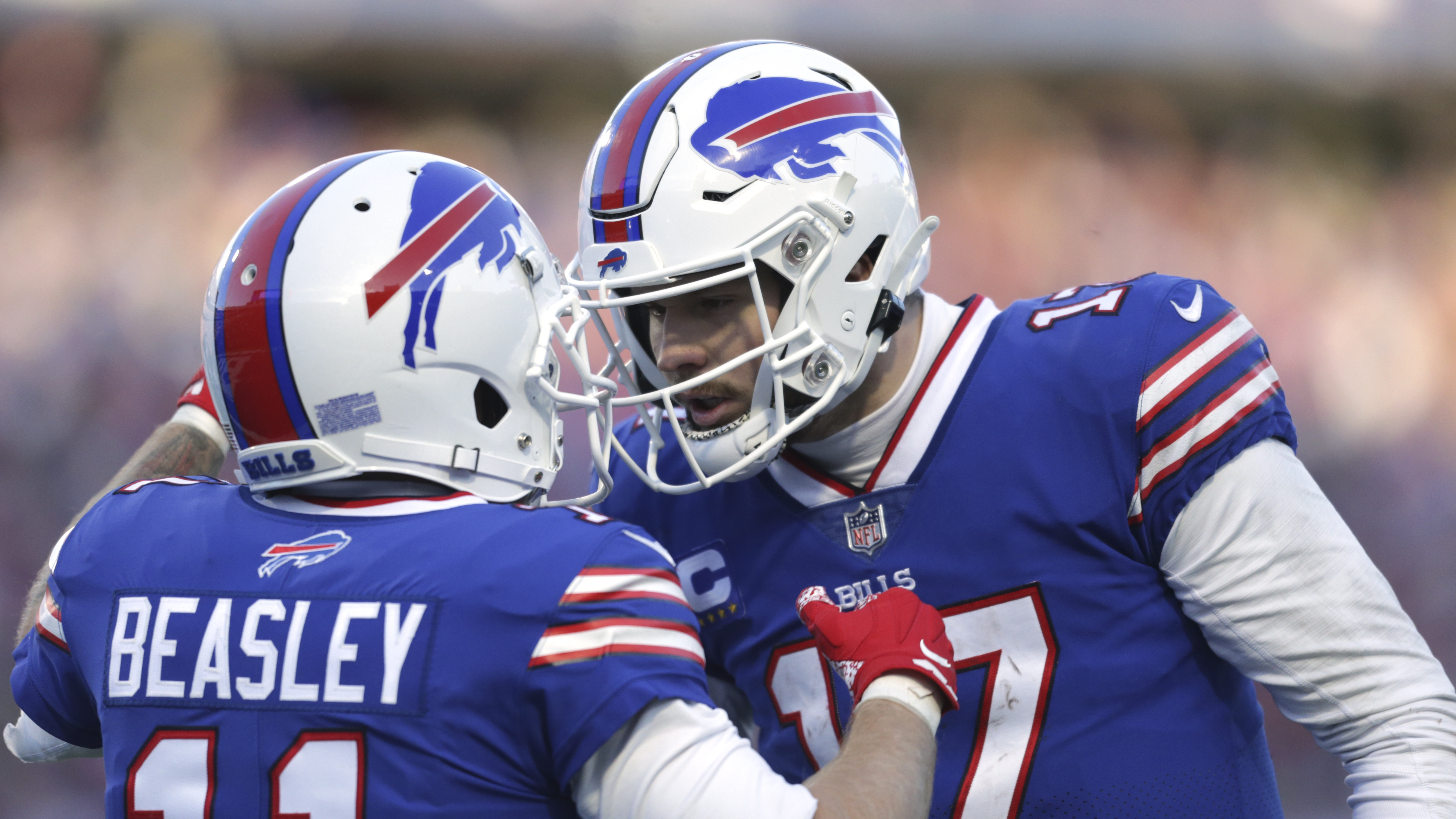 Buffalo Bills quarterback Josh Allen (17) is being sacked by Miami Dolphins  defensive tackle Zach Sieler (92) during fourth quarter of an NFL football  game at Highmark Stadium on Saturday, Dec. 17