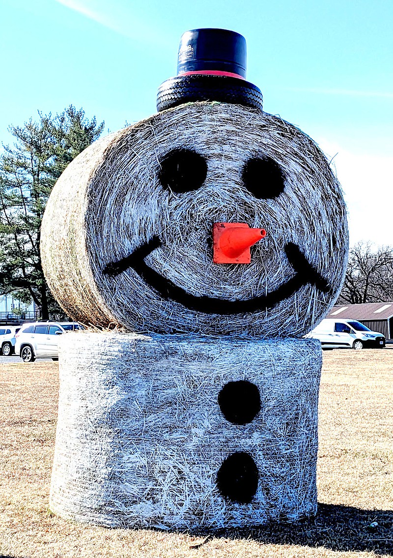 Westside Eagle Observer/Randy Moll
No snow doesn't have to mean no snowman. This one stands along the entrance to Ozarks Community Hospital in Gravette.