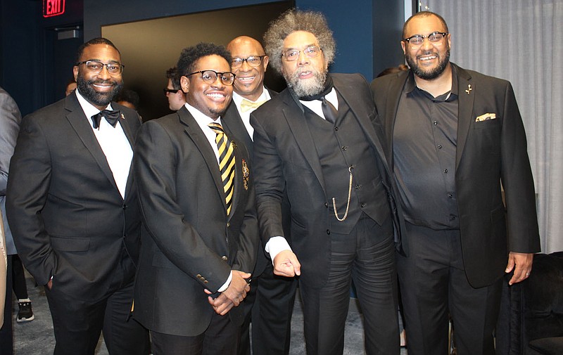 Cornel West, Recommitment Celebration speaker and civil rights activist (second from right) is joined by Quenton Green (from left), Jarron Gray, John L Colbert and Chris Seawood at the Northwest Arkansas Dr. Martin Luther King Jr. Council's annual event Jan. 14 at Fayetteville Public Library.
(NWA Democrat-Gazette/Carin Schoppmeyer)
