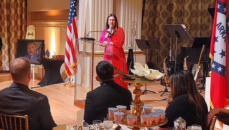Arkansas Gov. Sarah Sanders welcomes guests and gives remarks during the 2023 MLK Unity Interfaith Prayer Breakfast on Monday. (Pine Bluff Commercial/Eplunus Colvin)