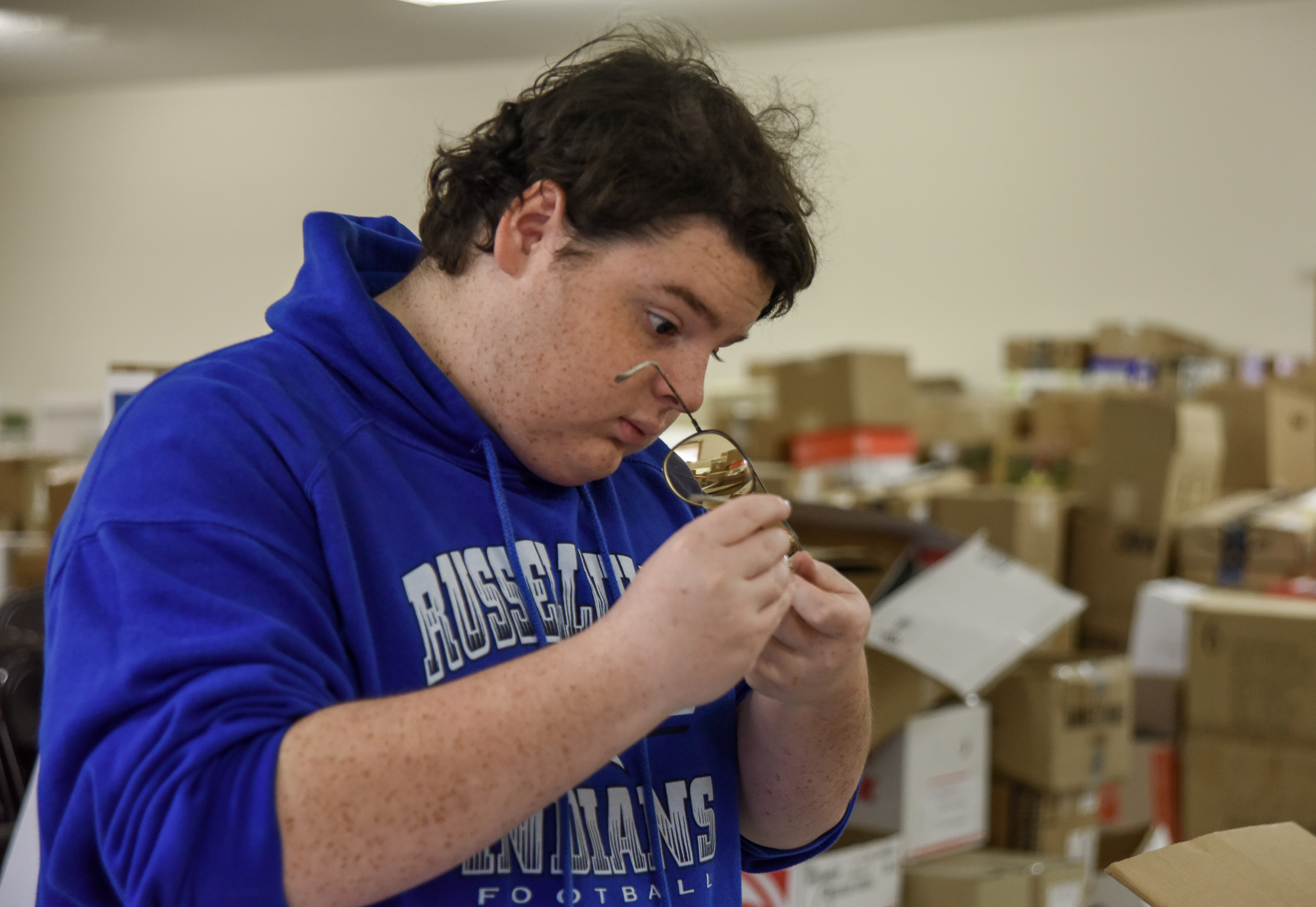 Russellville NHS students helps process donated eyeglasses Jefferson