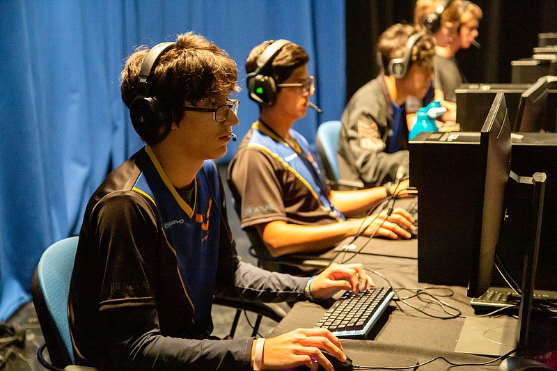 Courtesy of JBU
Students on the John Brown University Esports team play a game, in uniform, during a tournament.