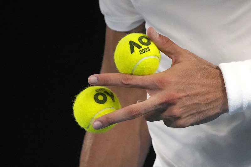 Matteo Berrettini of Italy prepares to serve to Andy Murray of Britain during their first round match at the Australian Open tennis championship in Melbourne, Australia, Tuesday, Jan. 17, 2023. (AP Photo/Aaron Favila)