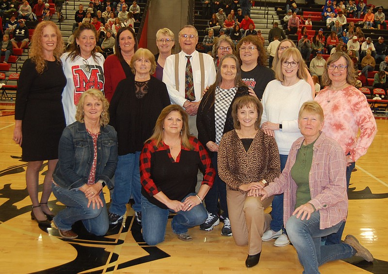 Bennett Horne/McDonald County Press The legendary 1980-1983 McDonald County Lady Mustangs basketball teams and their coach, Jerry Davis, were honored at halftime of the senior boys' Homecoming game on Friday, Jan. 13, at Mustang Arena. The teams, which were inducted into the Missouri Sports Hall of Fame last month, won state championships in 1981 and 1983 after finishing as runner-up in 1980. The '81 squad finished 29-1 overall while the '83 team posted a 31-1 record and won the three game before that year's championship game by an average of 21.6 points.