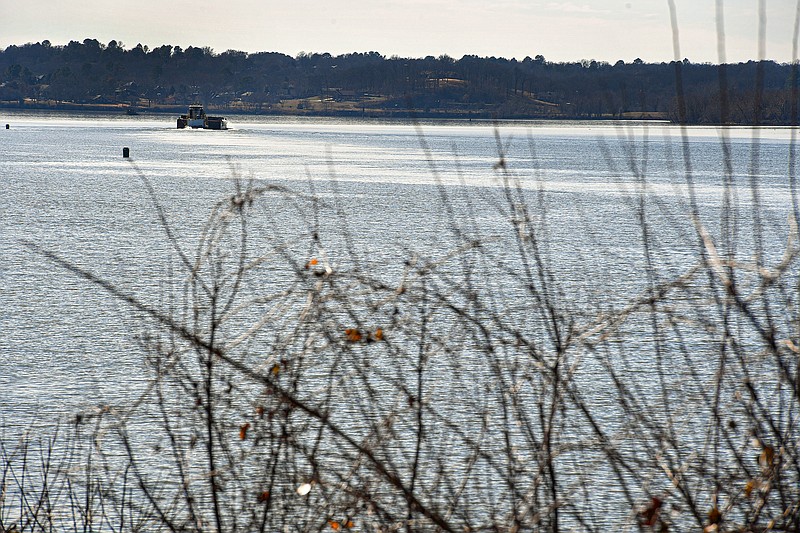 A vessel traverses the Arkansas River, Friday, Jan. 20, 2023, near Van Buren. At its meeting Wednesday, the Board of Directors for the Western Arkansas Intermodal Authority, an organization that plans and develops initiatives for transportation improvements benefiting western Arkansas, discussed traffic along the river. Visit nwaonline.com/photo for today's photo gallery.
(NWA Democrat-Gazette/Hank Layton)