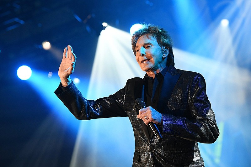 Barry Manilow performs in Phoenix in a 2019 file photo. Manilow will be 80 in June but doesn’t feel it or act like it. Just check his schedule. (Emma McIntyre/Getty Images for Celebrity Fight Night/TNS)