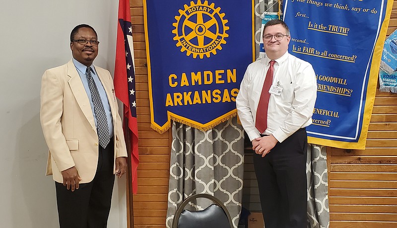 Photo by Kaci May
Dr. Cimenga M Tshibaka, general surgeon at Ouachita County Medical Center joined Joe Michael Givens, corporate compliance officer for OCMC, at Camden's Rotary Club on Tuesday.