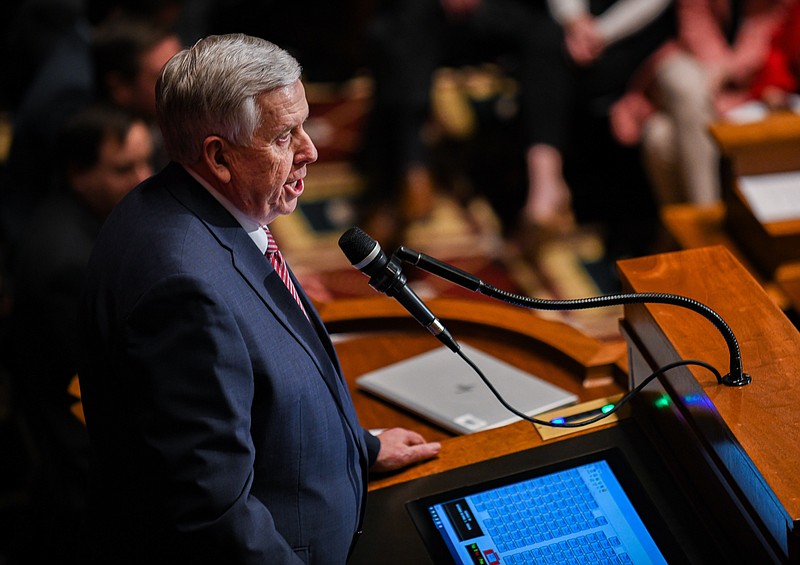 Julie Smith/News Tribune photo: 
Missouri Gov. Mike Parson is shown at the speaker's podium as he delivers the annual State of the State speech in the House of Representatives Chamber. The speech was paused numerous times as members of the joint session of legislators stood to applaud.