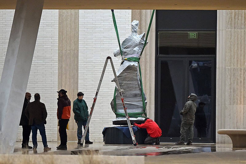 A sculpture is installed in the courtyard of the Arkansas Museum of Fine Arts on Wednesday, Jan. 18, 2023 in Little Rock. The new museum is set to open April 22 of this year. (Arkansas Democrat-Gazette/Staci Vandagriff)