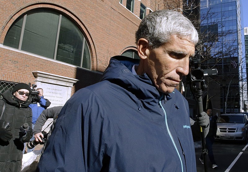 William "Rick" Singer, founder of the Edge College & Career Network, departs federal court in Boston on March 12, 2019. The mastermind of the nationwide college admissions bribery scandal, who was sentenced to three and a half years in prison on Jan. 4, is now working with underserved youths in Hot Springs to help students prepare for the future. - File photo by The Associated Press