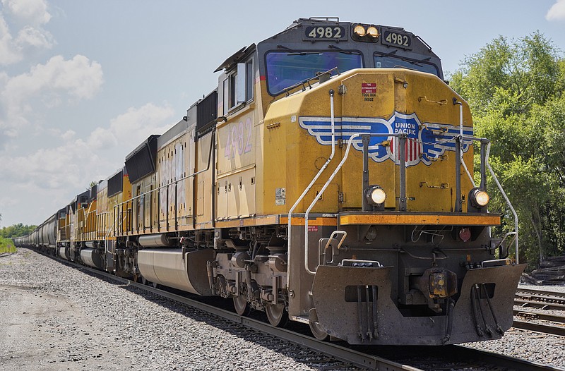 FILE - A Union Pacific train travels through Union, Neb., July 31, 2018. Union Pacific's latest attempt to move toward cutting its train crews down to one person remains on hold because of the longstanding safety concerns of the union that represents conductors. (AP Photo/Nati Harnik, File)