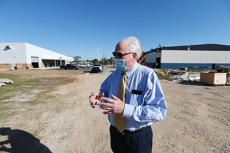 Dr. Jim Rollins, president of Northwest Technical Institute in Springdale, talks Sept. 30, 2020, about the school's new welding building (left) and ammonia building (right) under construction.  

(File Photo/NWA Democrat-Gazette/J.T. Wampler)