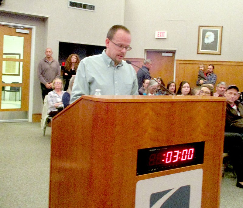 Marc Hayot/Herald-Leader Scott Jones, the Farmers Market manager for Main Street Siloam Springs, presents Main Street's Fourth Quarter report to the city board of directors during the city board meeting on Tuesday, Jan. 17.