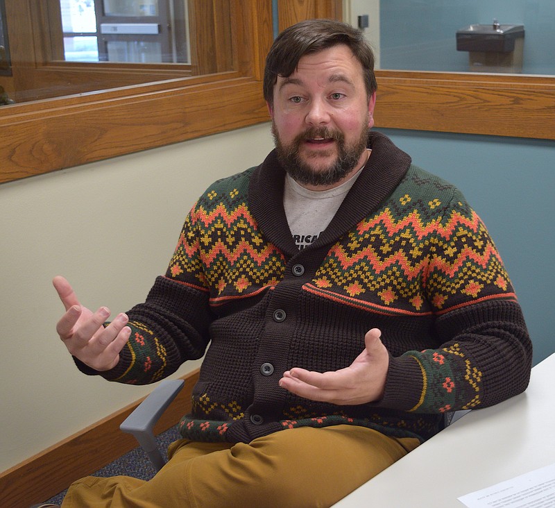 Garland County Library Director Adam Webb discusses state Senate Bill 81, which would create criminal and civil penalties for library and school employees for lending obscene material. - Photo by Donald Cross of The Sentinel-Record