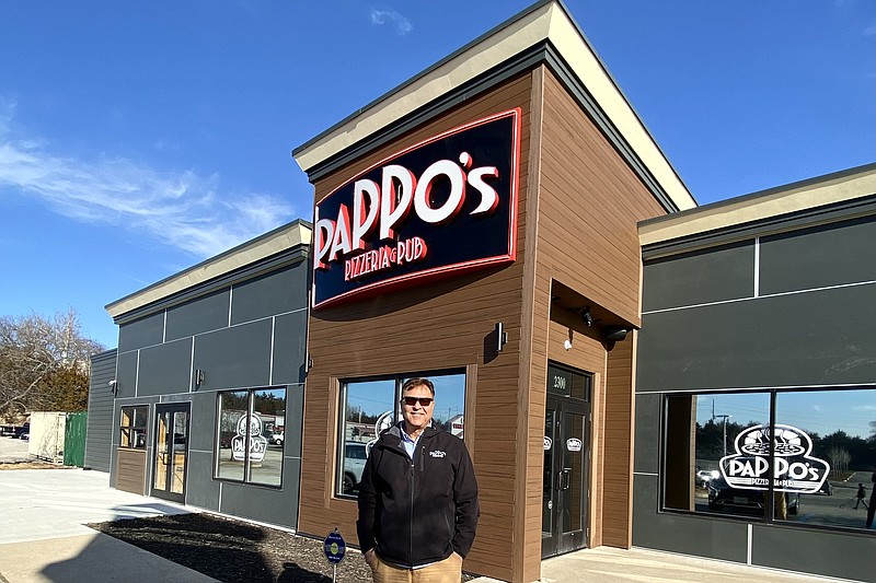 Cameron Gerber/News Tribune photo: 
Chris "Pappo" Galloway poses in front of the newly-opened PaPPo's Pizzeria and Pub on Missouri Boulevard.