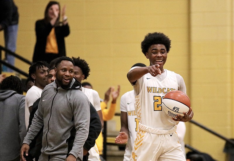 Khamani Cooper of Watson Chapel reacts to cameras after surpassing the 1,000-point career milestone in the second quarter of Friday's win over Warren at Watson Chapel. (Special to The Commercial/Jamie Hooks)