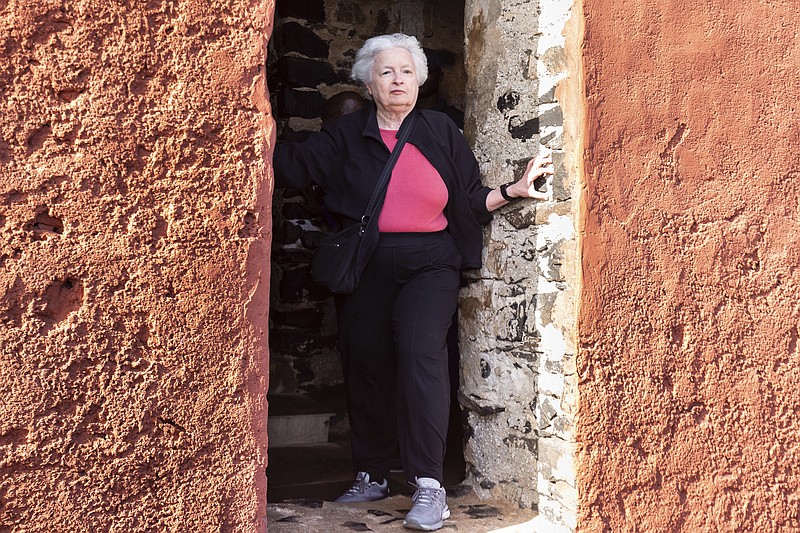 U.S. Treasury Secretary Janet Yellen stands in the "Door Of No Return" on Goree Island, Senegal, Saturday Jan. 21, 2023. Yellen has paid a solemn visit to an island off Senegal that is one of the most recognized symbols of the horrors of the Atlantic slave trade that trapped tens of millions of Africans in bondage. She is in Senegal as part of a 10-day trip aimed at rebuilding economic relationships between the U.S. and Africa. (AP Photo/Stefan Kleinowitz)