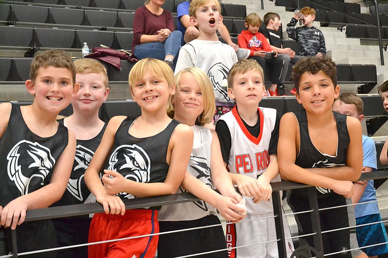 TIMES photograph by Annette Beard
Members of the third-grade Youth Competitive Basketball team cheered for the varsity Blackhawk boys Tuesday, Jan. 17, 2023, before playing ball during the varsity half-time game.