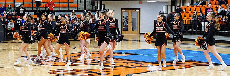 Westside Eagle Observer/Randy Moll
Gravette's cheerleaders perform a routine during halftime of Friday's basketball game at Gravette High School.