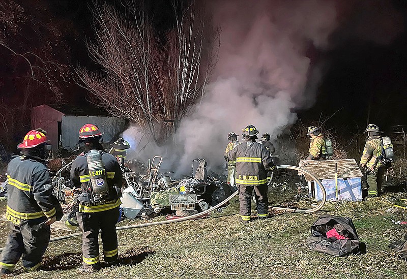 TIMES photograph by Annette Beard
Pea Ridge Fire Department was joined by members from Avoca, Little Flock and Northeast Benton County fire departments shortly before midnight Thursday, Jan. 19, 2023, in extinguishing a structure fire on Gates Lane.