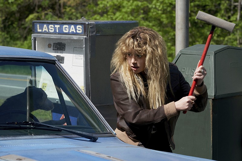 Natasha Lyonne performs in a scene from “Poker Face.” (Peacock via AP/Karolina Wojtasik)