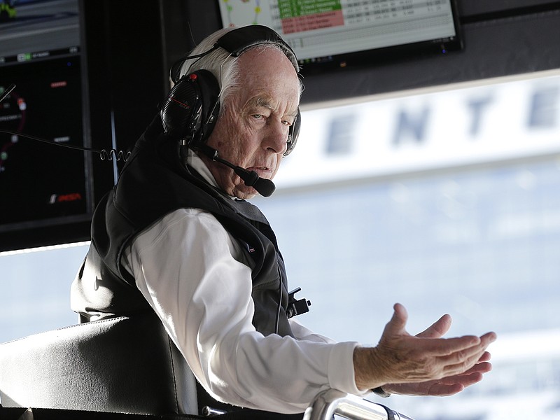FILE - Acura Team Penske owner Roger Penske gestures to a crew member during the Rolex 24 hour auto race at Daytona International Speedway, Saturday, Jan. 25, 2020, in Daytona Beach, Fla. That one hole in the Team Penske trophy case can only be filled by the 24 Hours of Le Mans. Winning the most prestigious sports car race in the world is on Penske's bucket as he prepares to turn 86 years old. (AP Photo/Terry Renna, File)