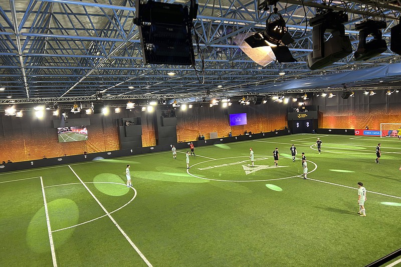 Players of the Kings League play a match in an industrial pavilion in Barcelona, Spain, Sunday, Jan. 22, 2023. Former Barcelona star Gerard Piqué is bidding to disrupt Spanish soccer with a new amateur seven-a-side competition designed to tap into the millions of young people who now prefer to watch a livestream instead of a 90-minute televised match. (AP Photo/Joseph Wilson)