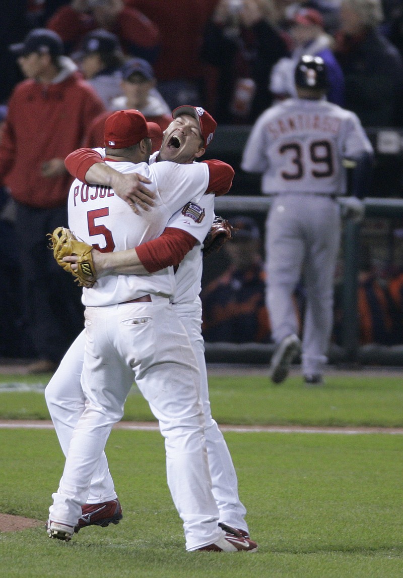 St. Louis Cardinals Scott Rolen and teammate Albert Pujols celebrate in Game 5 of the World Series in St. Louis, Oct. 27, 2006. Rolen could become just the 18th third baseman elected to baseball's Hall of Fame, the fewest of any position. Rolen, Todd Helton and Billy Wagner are the leading contenders in the Baseball Writers' Association of America vote announced Tuesday. - Photo by Tom Gannam of The Associated Press