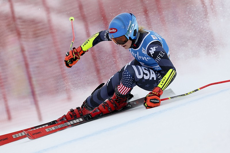 United States' Mikaela Shiffrin speeds down the course during an alpine ski, women's World Cup giant slalom, in Kronplatz, Italy, Tuesday, Jan. 24, 2023. (AP Photo/Alessandro Trovati)