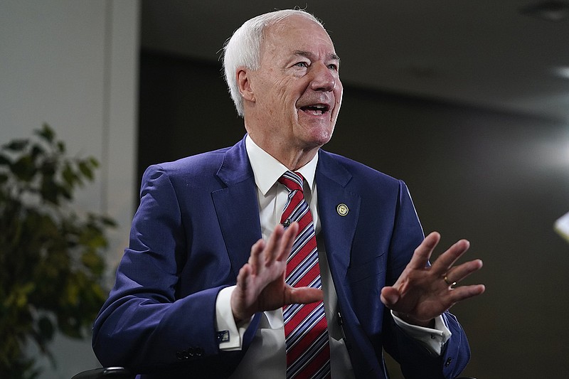 Then-Gov. Asa Hutchinson gestures Dec. 13 during an interview with the Associated Press in Washington. 
(File Photo/AP/Pablo Martinez Monsivais)