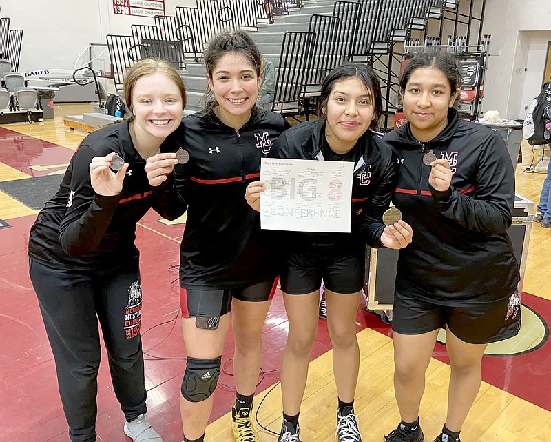 Submitted photo
The following McDonald County girls' wrestlers earned All-Conference honors at the Big 8 Conference championship on Jan. 18 at Nevada: (from left) Rylie Huston, second team; Helen Martinez-Mazariegos, honorable mention; Stacy Lopez-Apolinar, first team, and Giselle Aragon, honorable mention.