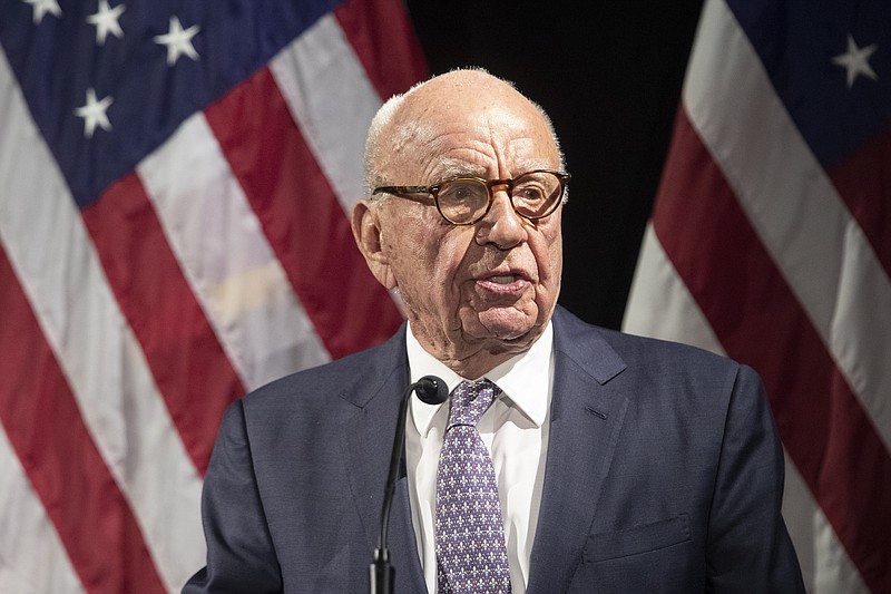FILE - Rupert Murdoch introduces Secretary of State Mike Pompeo during the Herman Kahn Award Gala, in New York, Oct. 30, 2018. Rupert Murdoch has pulled the plug on a proposal to bring together his News Corp. and Fox Corp., saying the merger wasn't coming at the right time for shareholders. In similar statements Tuesday, Jan. 24, 2023, the companies said their boards received letters from Murdoch withdrawing the plan. (AP Photo/Mary Altaffer, File)