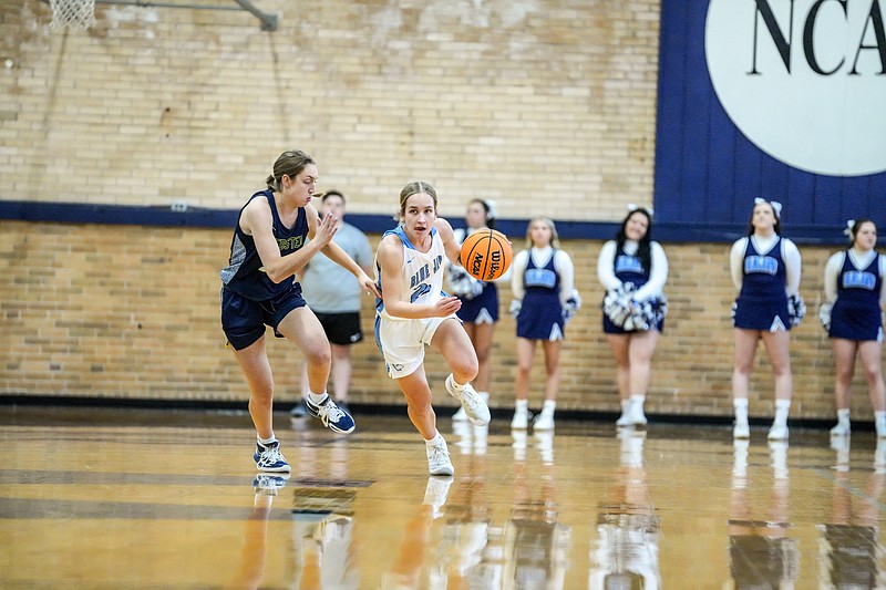 Westminster's Carli Libhart dribbles the ball against Webster on Jan. 14 at Historical Gymnasium in Fulton. (Courtesy/Westminster College Athletics)